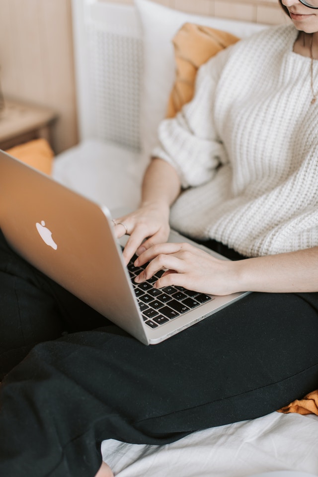 Photo by Vlada Karpovich: https://www.pexels.com/photo/crop-woman-typing-on-laptop-on-bed-4050405/